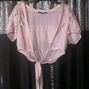 Rose-gold, cream color blouse.